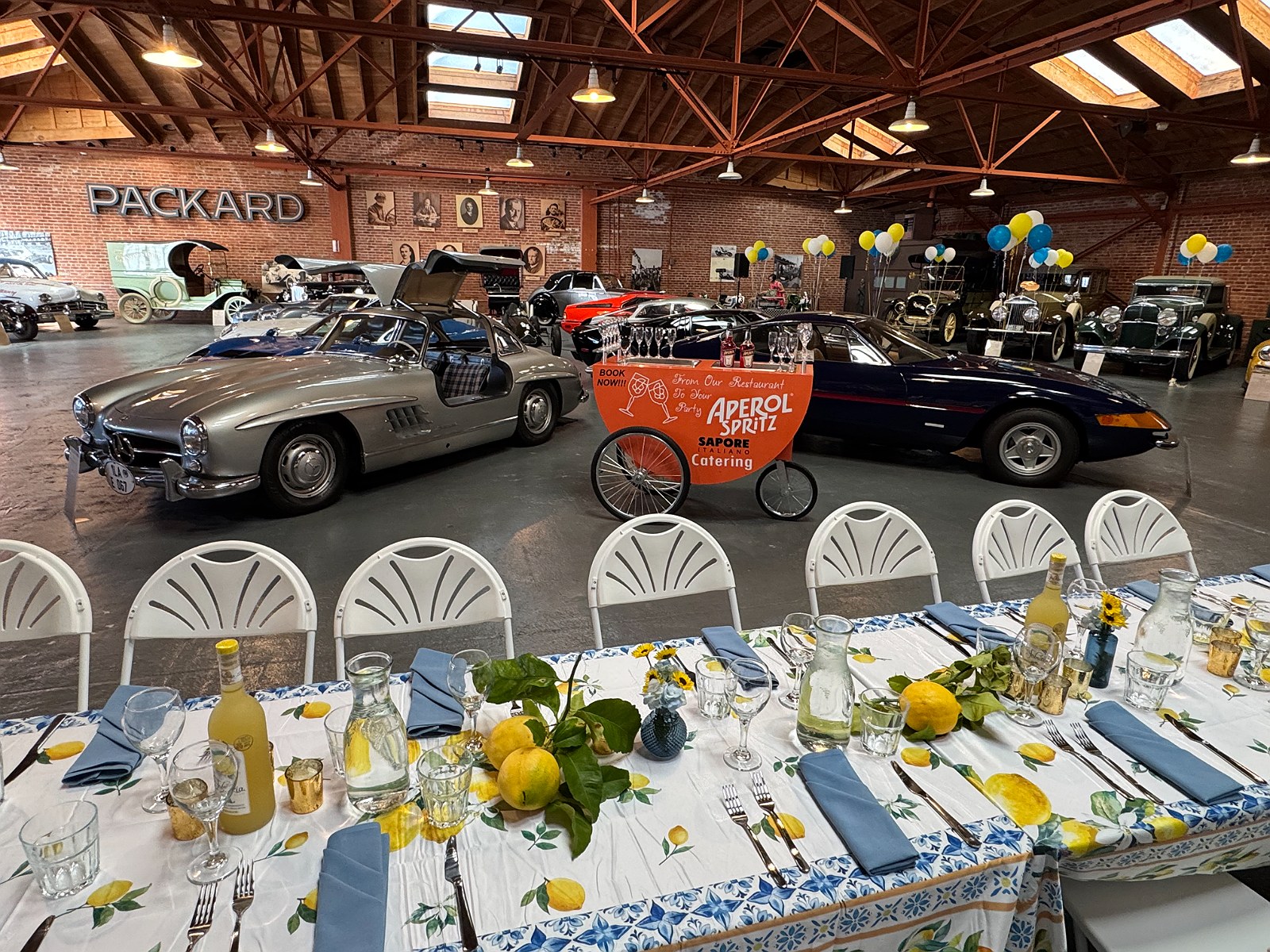 An aperitivo cart parked beside the Gullwing