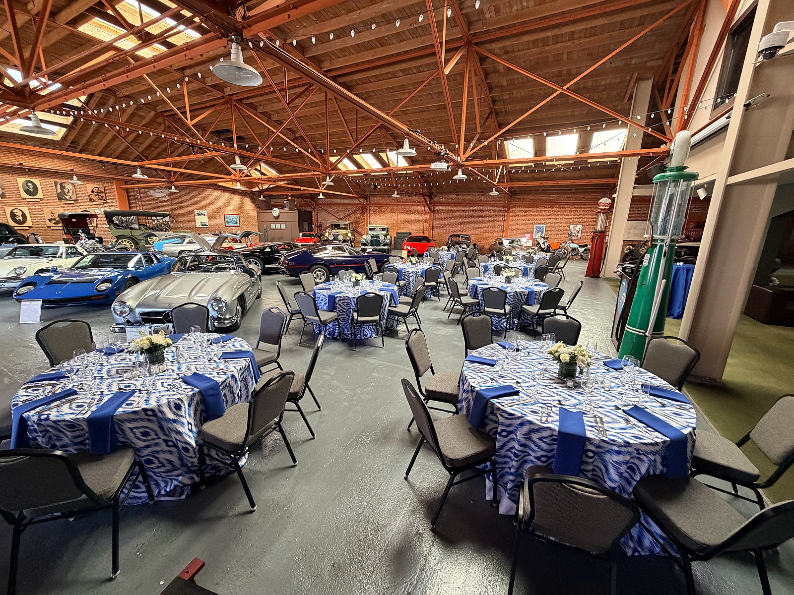 Round tables in blue linen among the collection