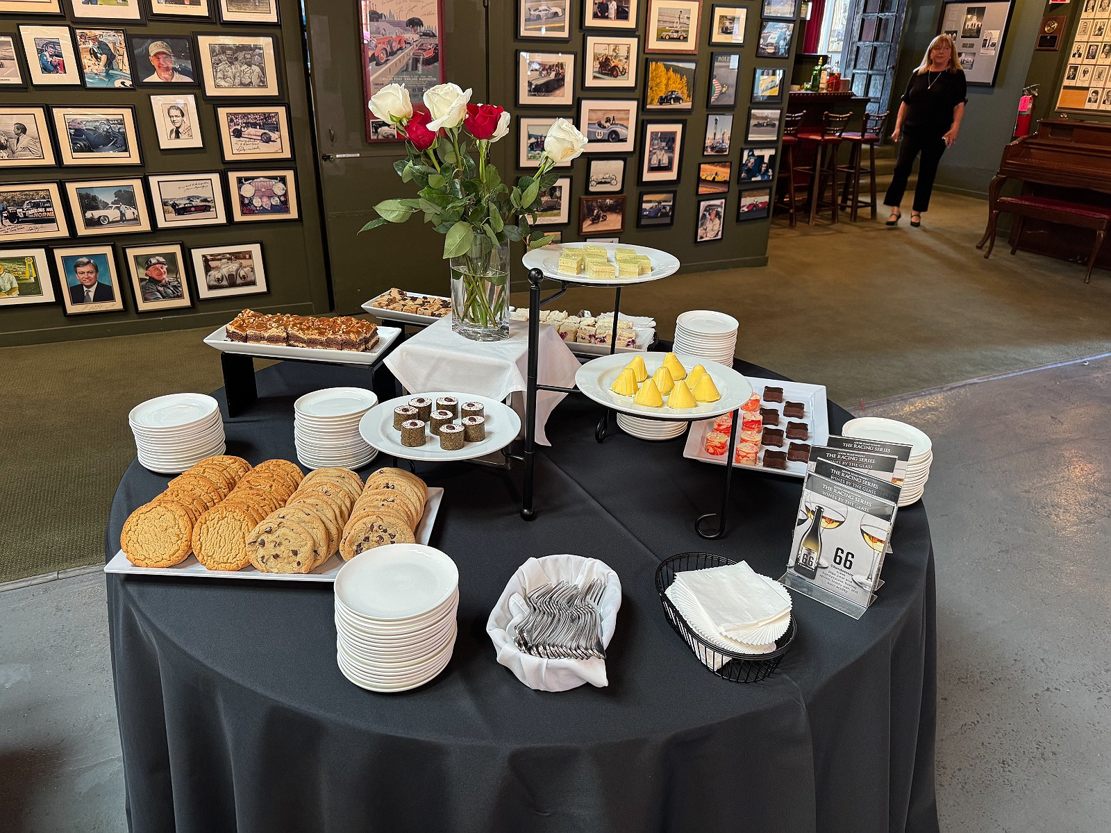 Sweets laid out beside the racing photograph wall