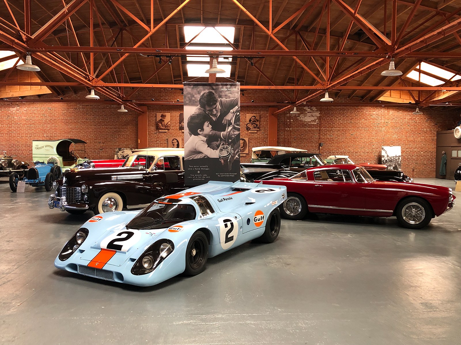 The hall between events, a Gulf Porsche 917 at its centre