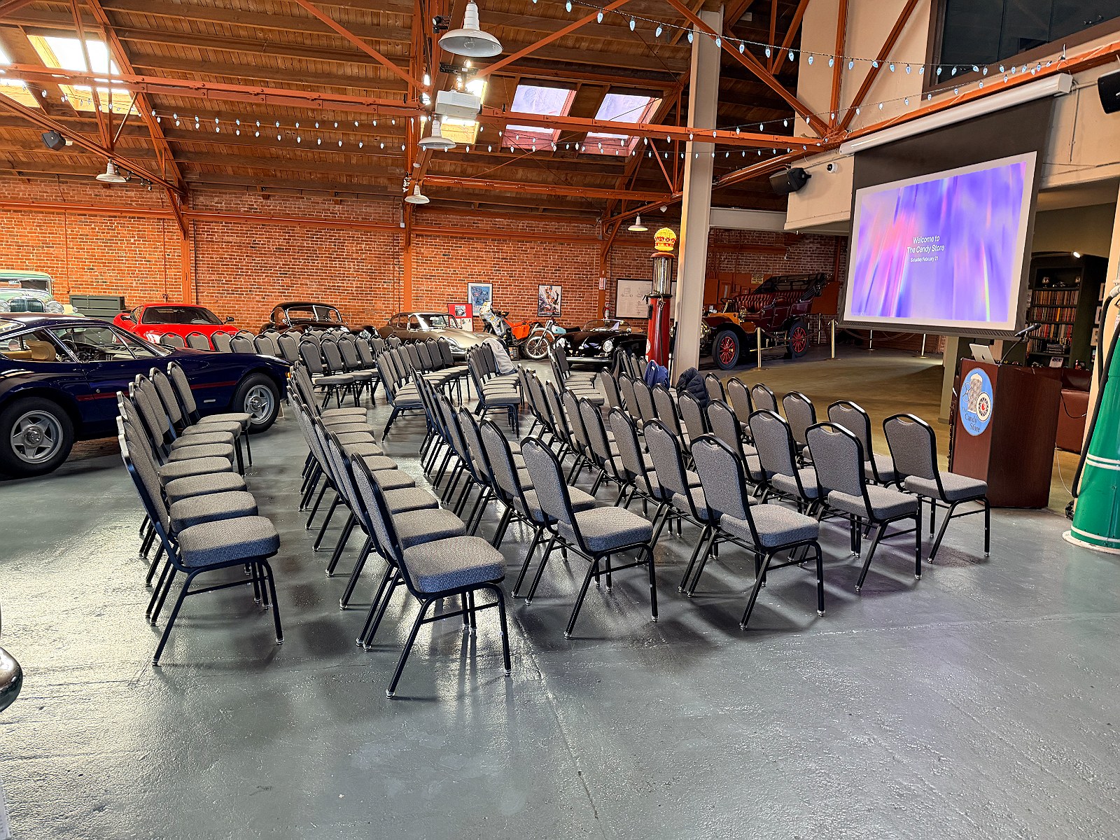 Theatre seating arranged before a projection screen
